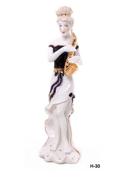

Figurine lady with saxophone 30 cm