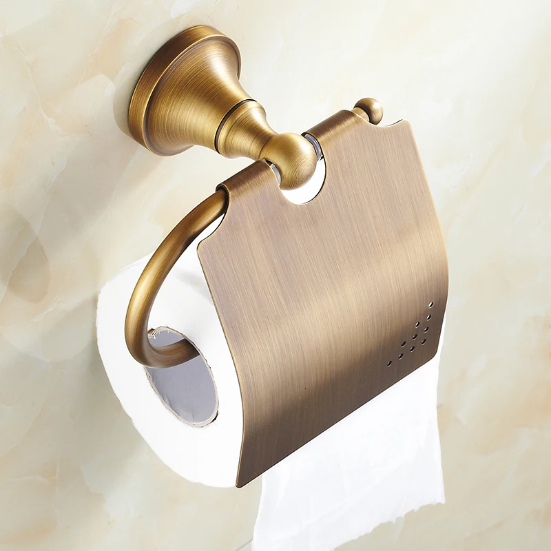 Old brass toilet paper holder, toilet paper roll hung on the wall, bathroom accessories