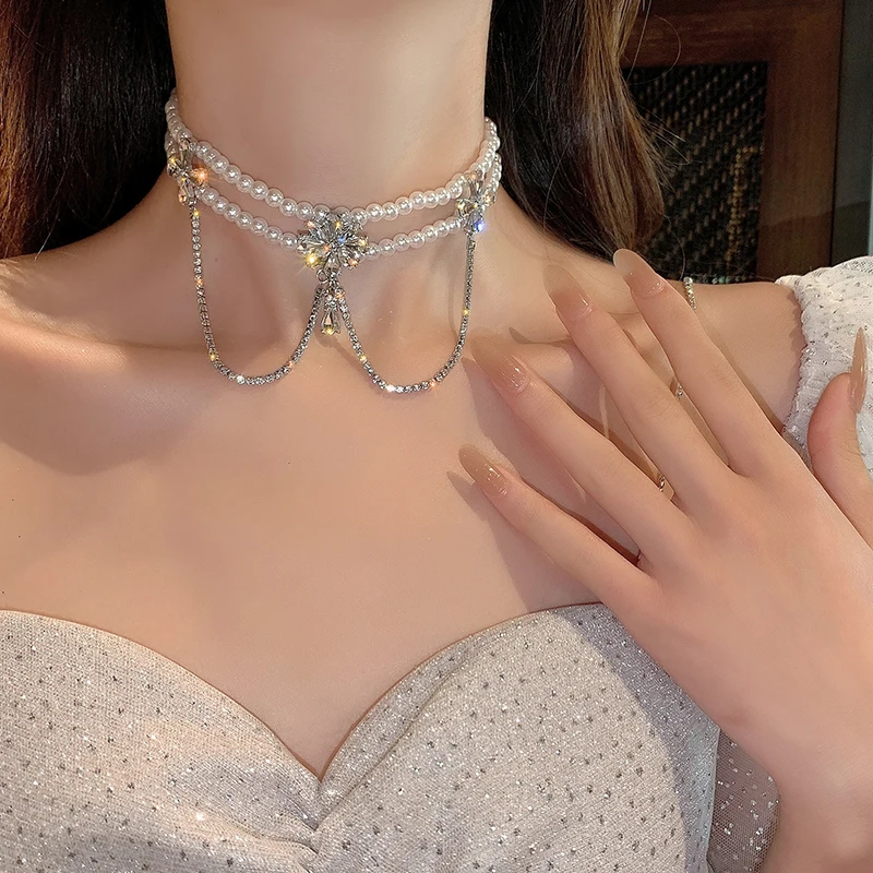 Ожерелье женское длиной до ключиц с белым жемчугом и кисточкой корейский дизайн