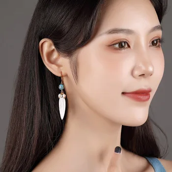 

Ethnic Earring Clear Color Resin Irregular Shell Made feather Drop Earrings for Women Brincos Earing Wedding Jewelry Girl Gift