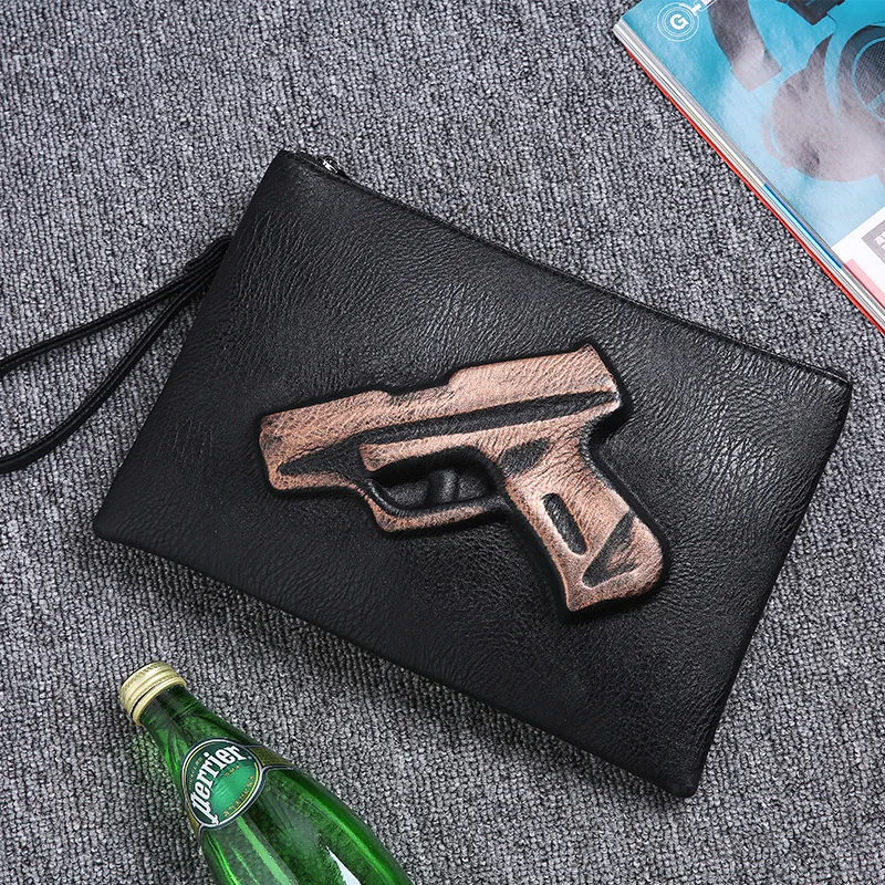 

Personality pattern three-dimensional street leather wrist bag Korean version of fashionable men's hand bag