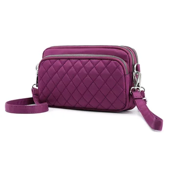 

Cloth bag 2020 summer new messenger bag female waist bag vertical version small fresh nylon shoulder clutch bag tide