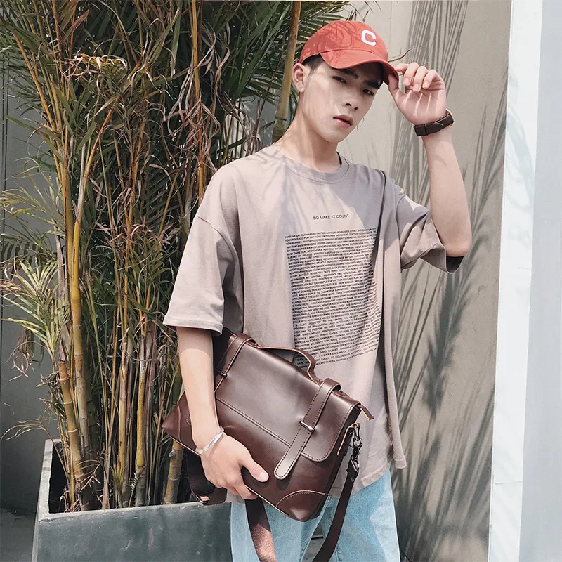 

The new Korean version of men's handbags casual retro briefcase men's retro backpack shoulder bag