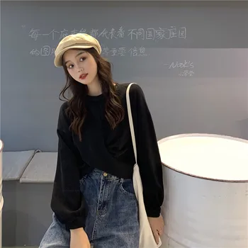 

2020 spring and Autumn New Korean fashion loose solid color round neck long sleeve top short open navel bodysuit female fashion