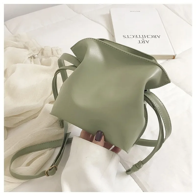 

2020 new female bag small bag Korean ins simple solid color pu wild drawstring shoulder bucket bag casual messenger bag