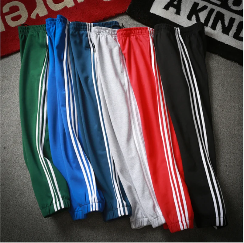 

Solid color men's sports running pants drawstring sports football pants training sports pants stretch pants running sports pants