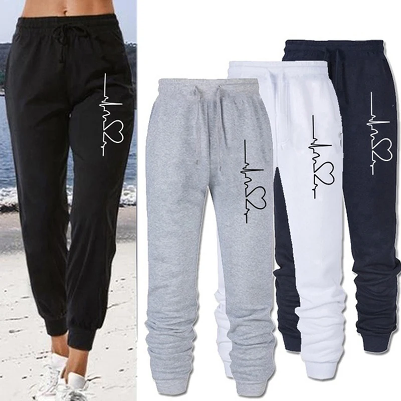 Vendedor Caliente Pantalones deportivos holgados de cintura elástica para hombre y mujer, ropa de calle con estampado para parejas, de chándal liso Unisex Kjwneg90q9W
