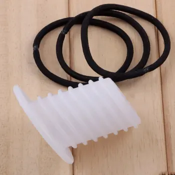 

Three-dimensional Erect Ponytail Tray Dispenser To Send Rubber Bands