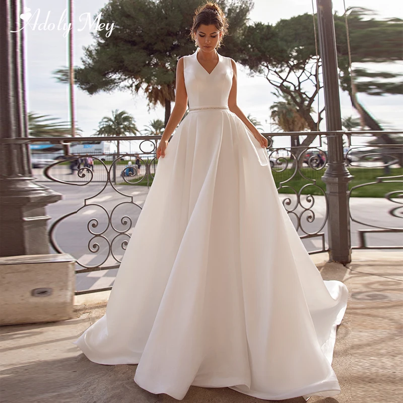 

Adoly Mey New Arrival Charming V-Neck Button Satin A-Line Wedding Dress 2020 Luxury Sashes Beaded Brush Train Vintage Bride Gown