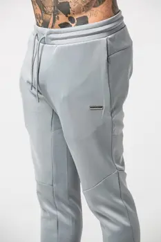 

2020 New Jogger Men's Sports Casual Pants Muscle Outdoor Fitness Running Pants Fashion Brand Cotton Elastic Waist Pencil Pants