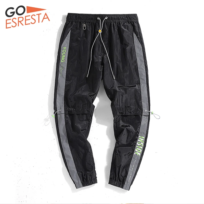 

GOESRESTA 2020 Summer Casual Men Sweatpants Street Wear Drawstring Hip-hop Joggers Pencil Pants Loose Reflective Trousers Men
