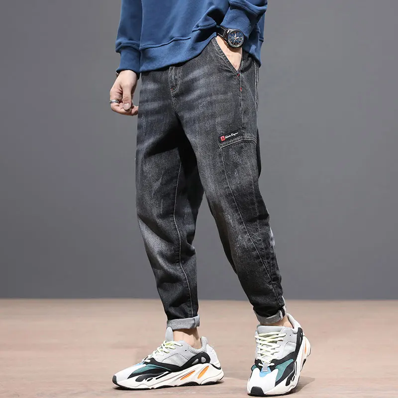 

Fashion Streetwear Men Jeans Loose Fit Black Gray Color Spliced Denim Harem Pants Korean Style Hip Hop Jeans Men Taper Trousers