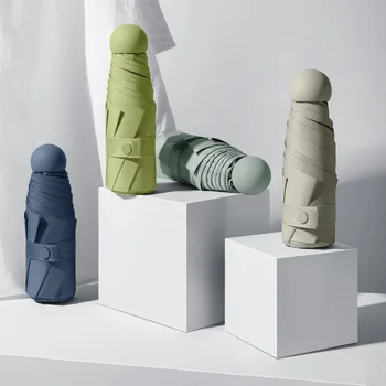 

Ultra Light capsule umbrella five-fold pocket umbrella black plastic parasol sunscreen umbrella women's small black umbrella