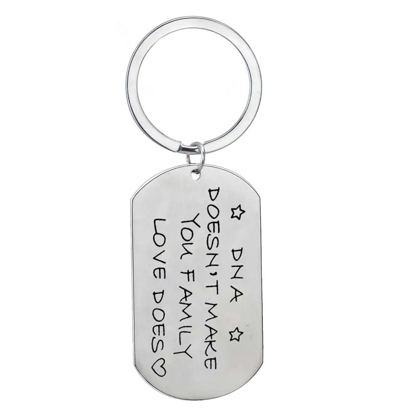 Details about   DNA Doesn't Make You Family Love Does Words Stainless Steel Key Ring Hanging Key 