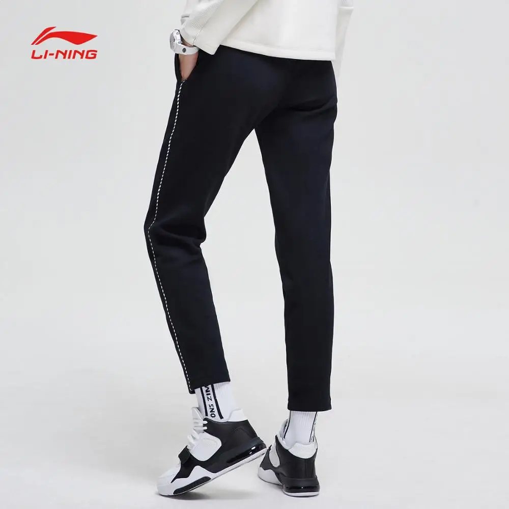 Женские баскетбольные спортивные штаны Li Ning флисовые теплые брюки из 66%