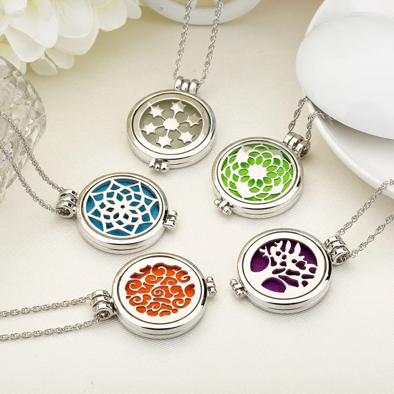 

7 PC Luminous Aromatherapy Pendant Perfume Necklace Round shape All sorts of design Stainless Steel Glowing In Dark Necklace