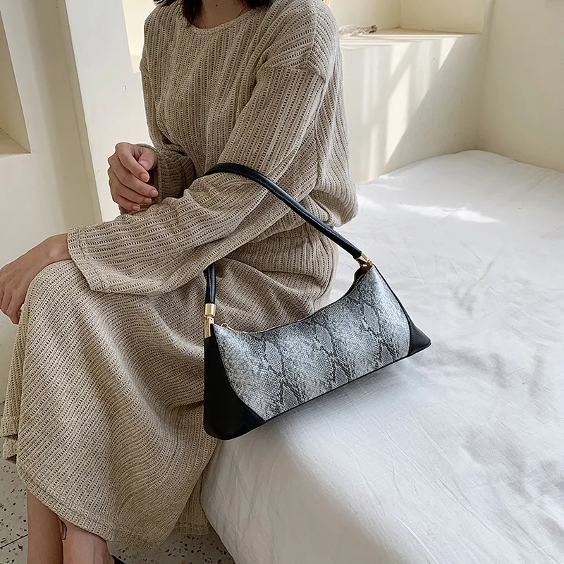 

Korean version of pu snakeskin women's shoulder bag spring 2020 simple and versatile soft face arm bag hand bags
