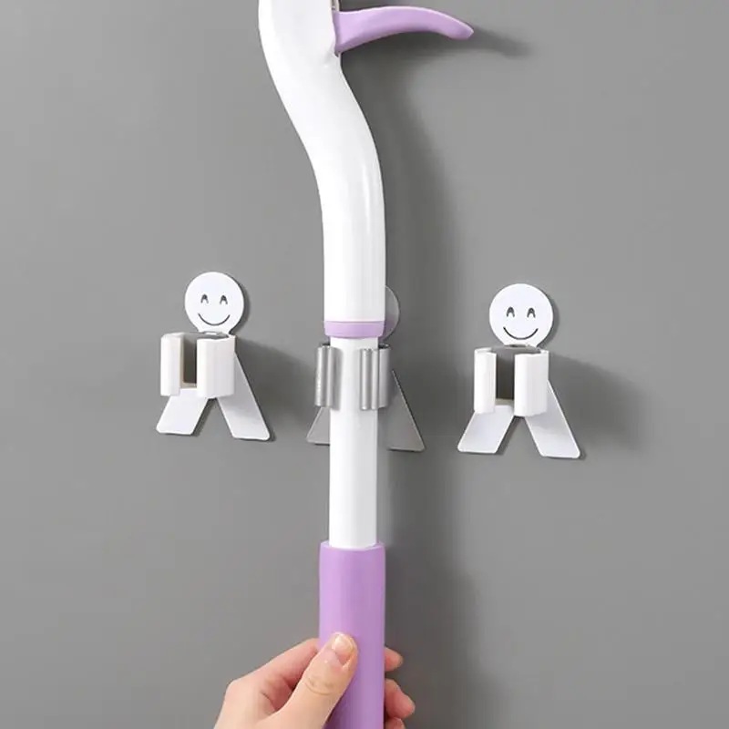 

Sturdy And Powerful Seamless Sticker Hanging Mop Holder Smiley Seamless Broom Rack Storage Rack Kitchen Utensils Mop Hook