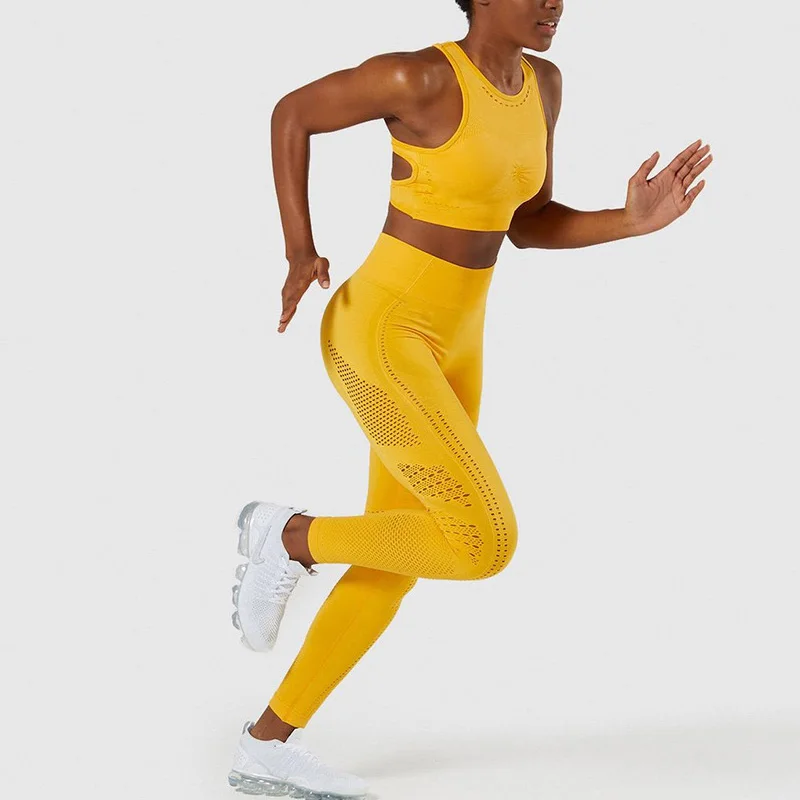 Yellow NORMOV Casual Seamless Women Leggings Fitness High Waist Push Up Ankle Length Hollow Out Polyester Leggin Workout Solid Leggings - Color: Yellow
