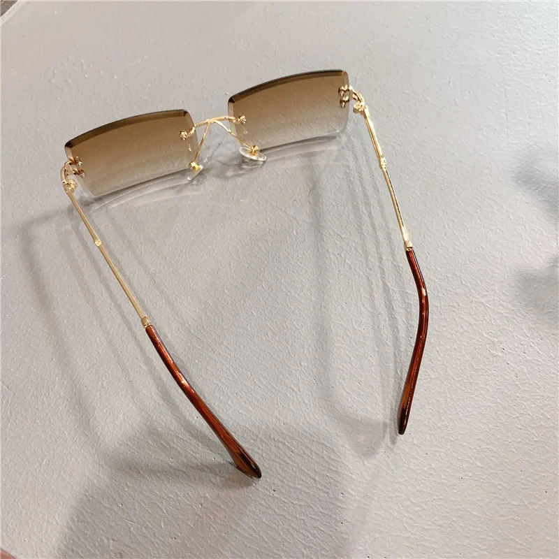 2021 Fashion Women Rimless Rectagular Cutting Lens Sun Glasses Retro Gradient Red Sunglasses Wholesale UV400 cute sunglasses