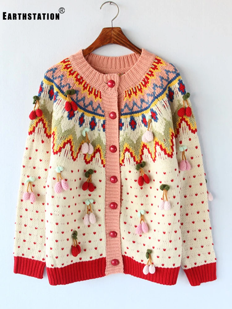 Плотный вязаный свитер с аппликацией контрастных цветов и геометрическими