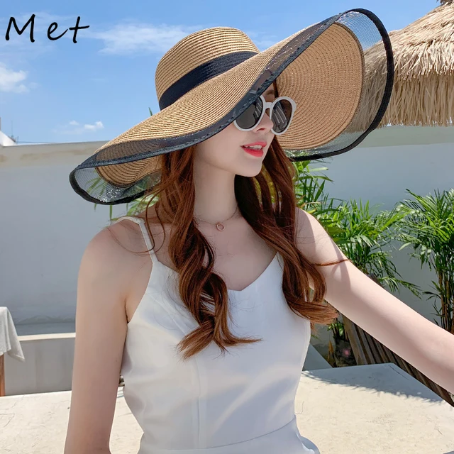 Foldable black straw beach hat