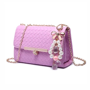 

Women's handbag with beautiful accessories fashion weave style shoulder bag