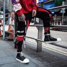 Новые мужские брюки с карманами и рюшами