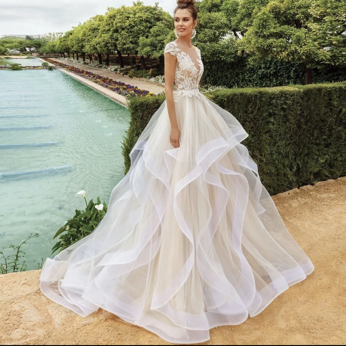 Princess-cut wedding gowns in... - Elizabeth Passion | Facebook