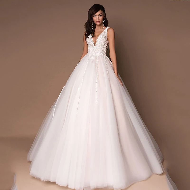 Tulle Deep V-Neck Sleeveless Princess Wedding Dresses 2021 Puffy Beads Appliques Bridal Dresses Ball Gown Vestidos De Novia modest wedding dresses