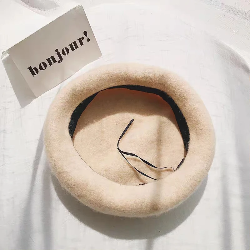 Ladies hat beret female wool beret autumn / winter newspaper hat retro warm painter hat female hat solid color elegant woman