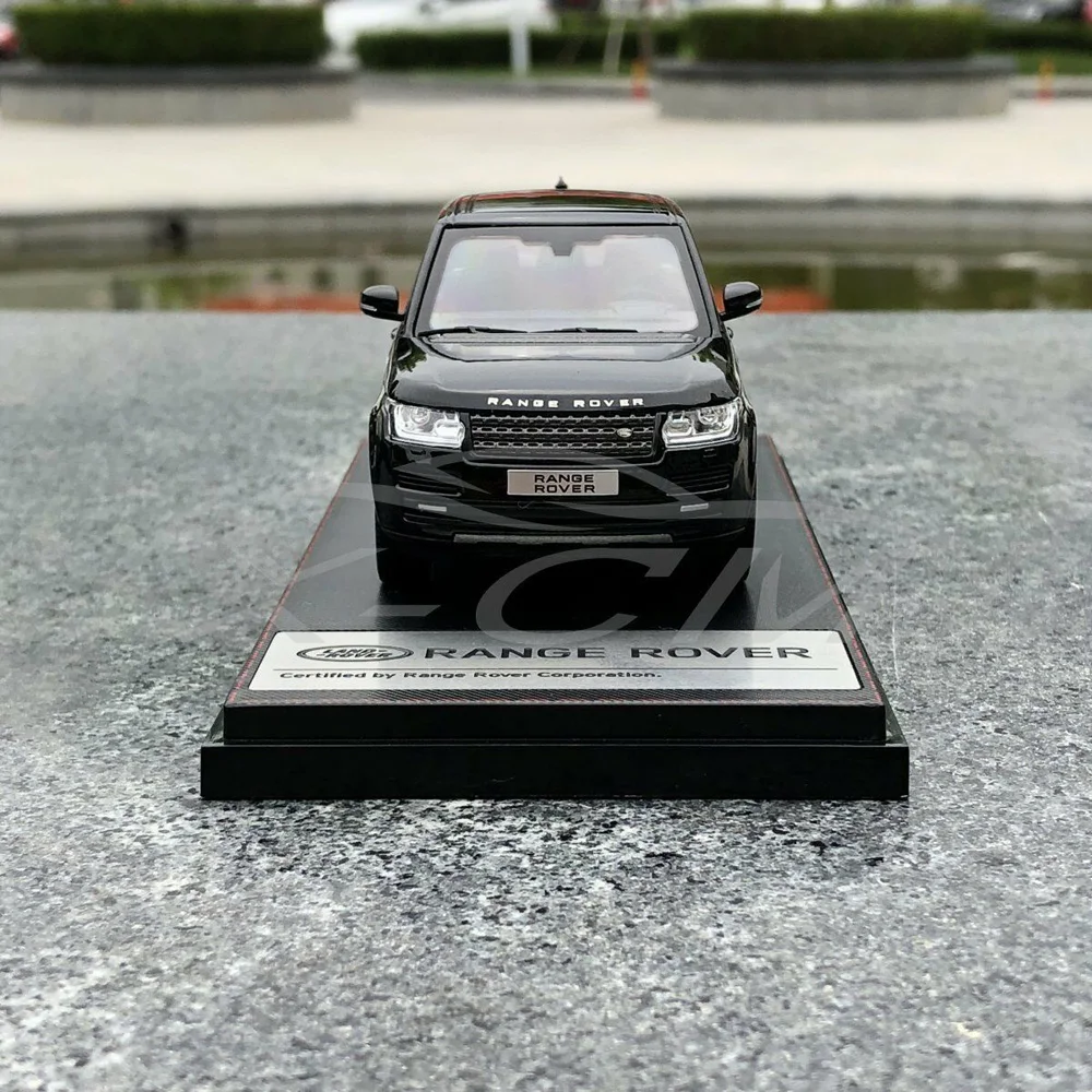 Модель автомобиля ЖК Модели Range Rover 1:43 (черный) + маленький подарок!| |