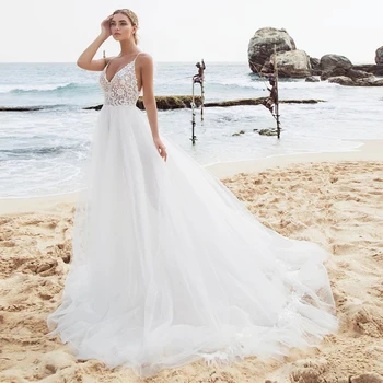 

Charming Tulle Beach Wedding Dress 2020 Boho V-neck Spaghetti Straps Backless White Ivory A Line Wedding Gowns