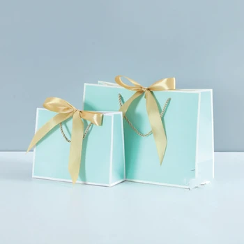 

Clothing Cosmetic Shopping Paper Bag Birthday Packaging Gift Bog Paper Bag Party Wedding Gift Wrapping with Handle Free Shipping