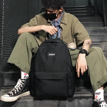 

Backshoulder bag men's tide brand retro large capacity simple female high school student bag fashion solid color canvas backpack