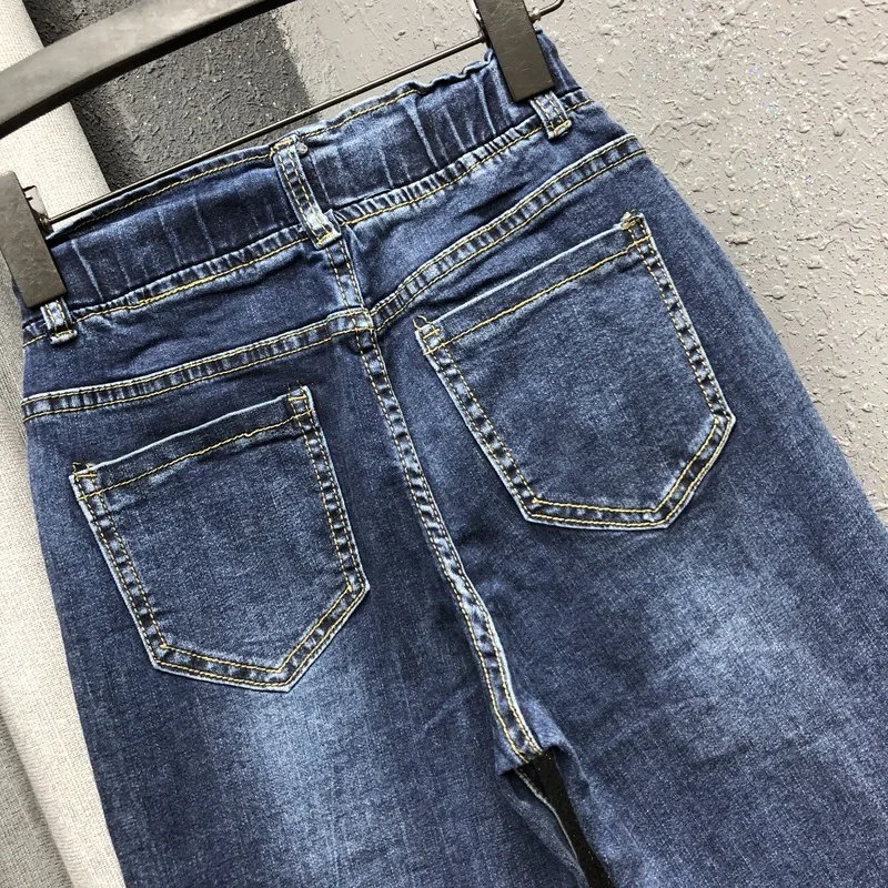 hole Personality patch patch pants women spring and autumn new Korean version of the slim loose harem pants