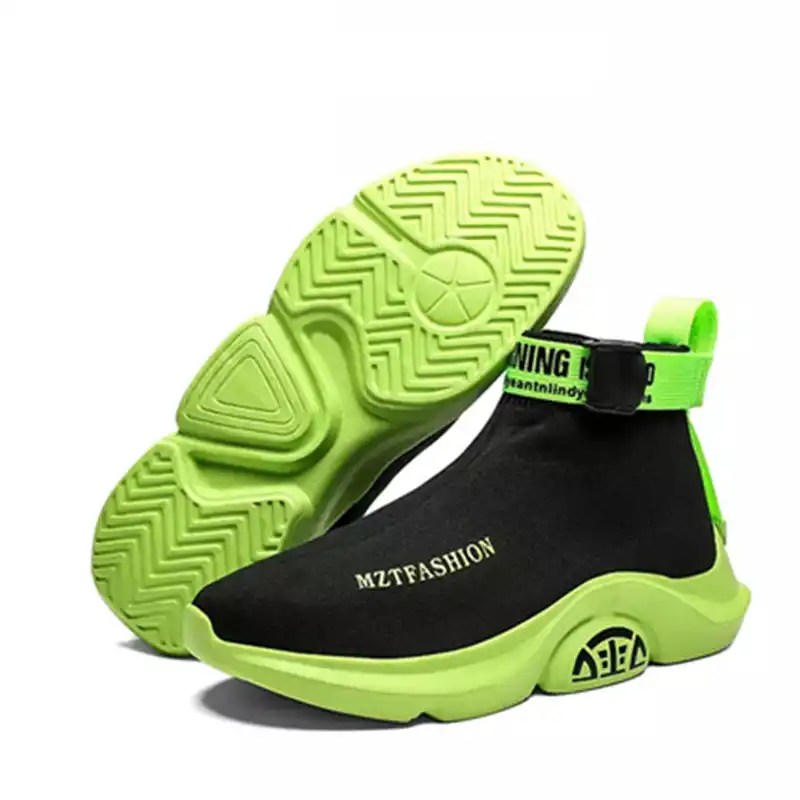 black and neon green sneakers