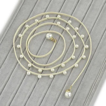 

Hot Spring and Summer Korean Version of The New Women's Pearl Belt Sweet Dress Decorated with Trouser Straps.