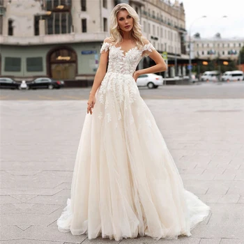 

Champagne Tulle Boho Wedding Dress Beach Lace Appliques Bridal Gown O-neck Illusion Tulle Short Sleeves Vintage Wedding Gowns