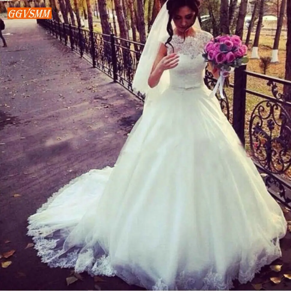 

Romantic Boho O Neck Wedding Dresses 2020 Sleeveless Lace Applique Tulle Ball Gown Marry Bridal Dress Sweep Train Wedding Gowns