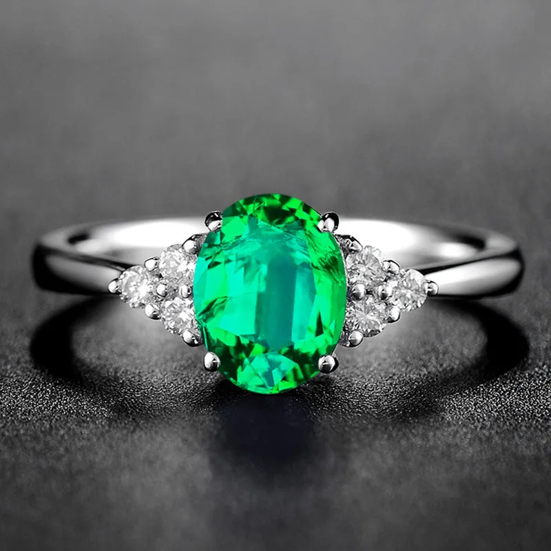 Caiyayinuo Luxury 925 Silver Ring With Green Oval Emerald Gemstone Silver Woman Open Adjust Size Classicparty Gift Wholesale Caiyayinuo Luxury 925 Silver Ring With Green Oval Emerald Gemstone Silver Woman Open Adjust Size Classicparty Gift Wholesale