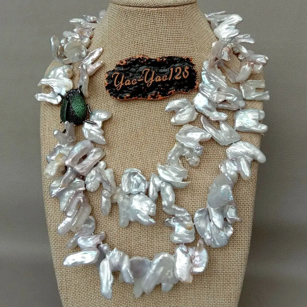 

Multi Strand White Keshi Pearl Necklace CZ Pave Insect Pendant 18