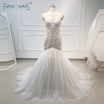 شراءفساتين زفاف فاخرة حورية البحر 2020 رقبة عالية صناعة يدوية دانتيل مطرز ثوب زفاف مع ذيل قابل للإزالة رداء De Mariee Casamento