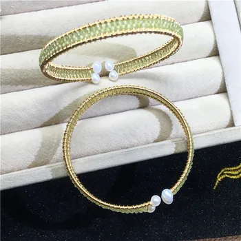

Natural olivine small particles with 14K gold injection winding woven bracelet