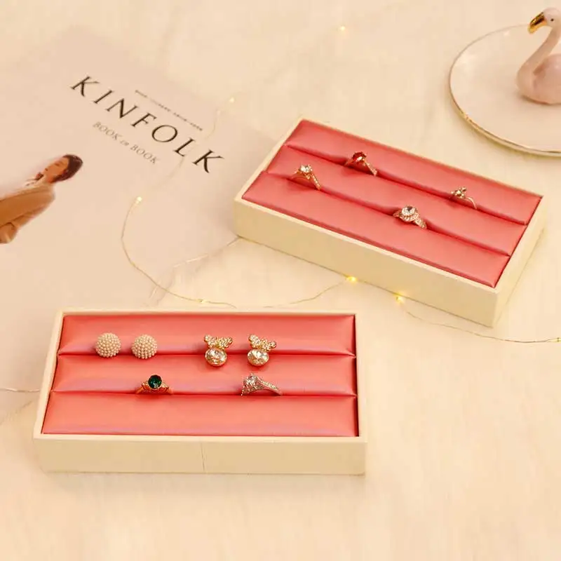 

Fashionable Rose Red Color PU Leather Jewelry Display Stand Ring Holder Display Tray for Jewelry Counter Ring Expositor
