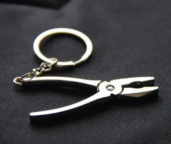 

Wholesale 100 pcs Special new creative car key chain key ring imitation tool vice activities can be customized logo lettering