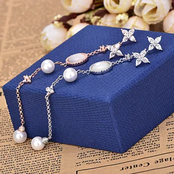 

Fashion brand jewelry fritillary pearl long tassel earrings personality asymmetry earrings for women