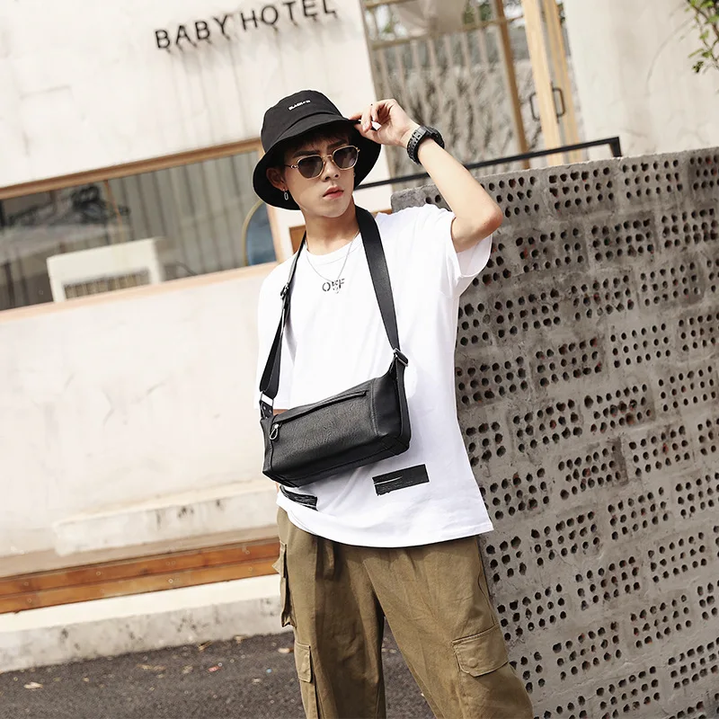

Korean version of simple portable men's small backpack single shoulder bag outdoor oblique span bag new male bag fashion