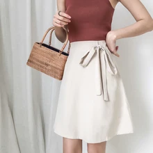 Summer women solid color skirt thin bow decoration girly style a-line skirt wild black white college style skirt tide