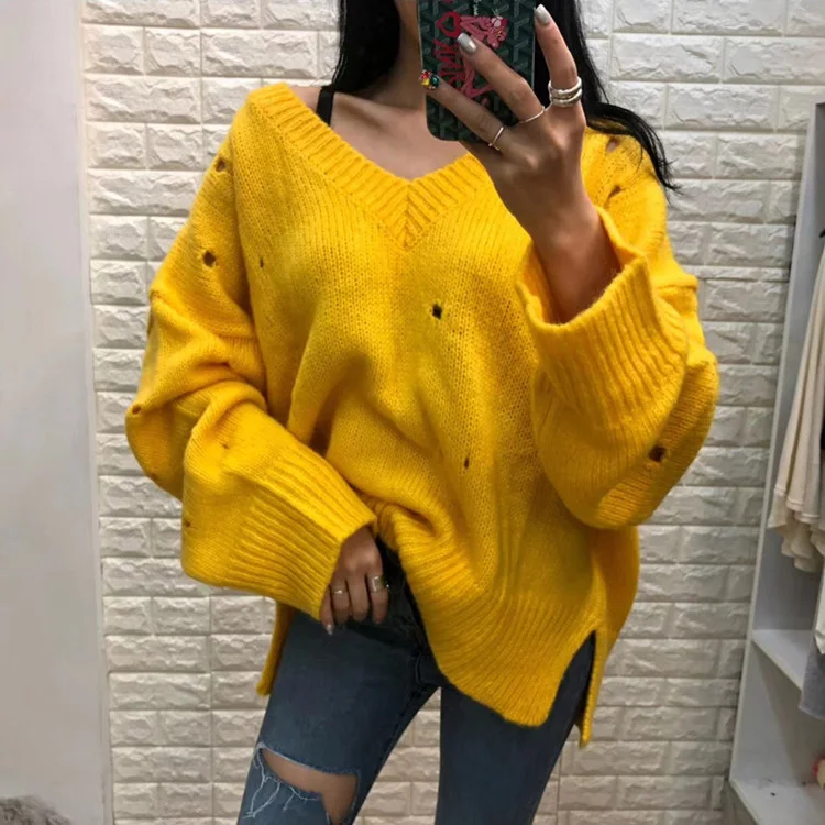 yellow sweater